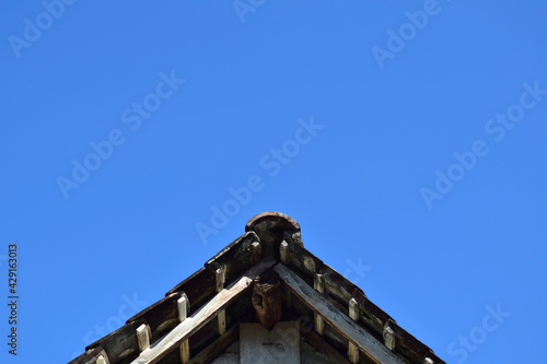 minimalist of roof with blue sky background 