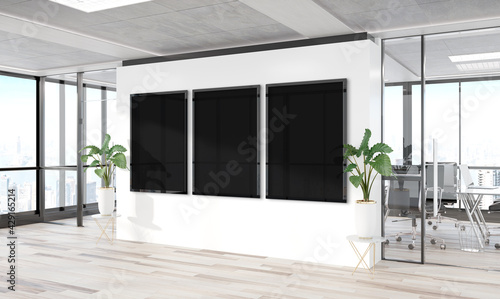 Three vertical frames Mockup hanging on wall. Mock up of billboards in modern wooden office interior 3D rendering © sdecoret