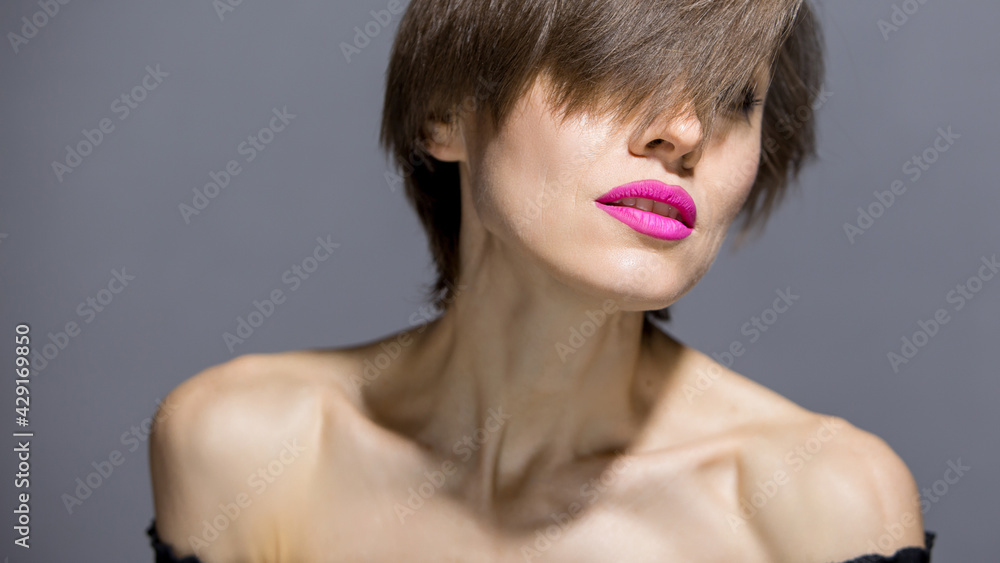 35-40 years old caucasian woman with short natural hair 35-40 years old caucasian woman with short natural hair