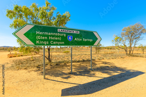 Northern Territory, Australia Outback. Larapinta drive signboard direction Kings Canyon, Hermannsburg, Alice Springs and Glen Helen. Tourism in Central Australia, Red Centre. Dry season. photo