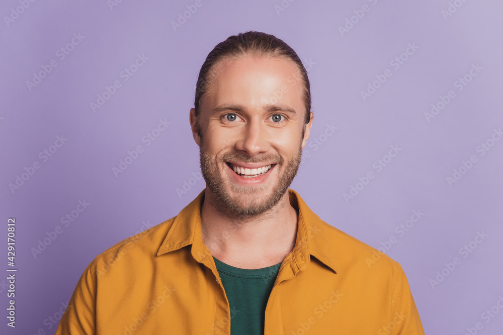 Close up portrait of handsome cheerful guy with beard posing Close up portrait of handsome cheerful guy with beard posing