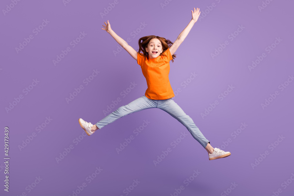 Full length body size view of attractive girlish cheerful girl jumping fooling having fun isolated over violet purple color background