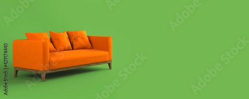Cuadro en lienzo Modern scandinavian bright orange fabric sofa with soft pillows on wooden legs on green background flat lay side view
