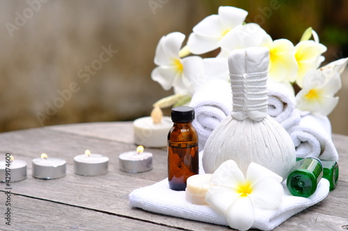 spa still life with white flower and towel