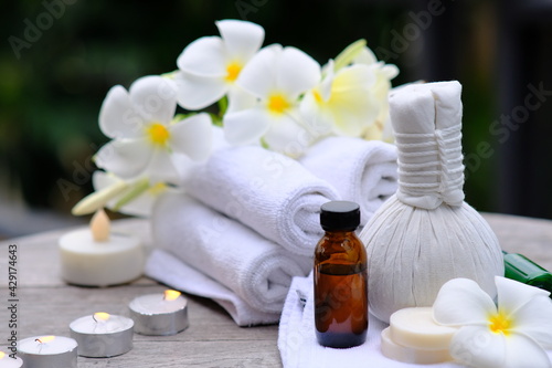 Spa treatments on old wooden table and candle light atmosphere