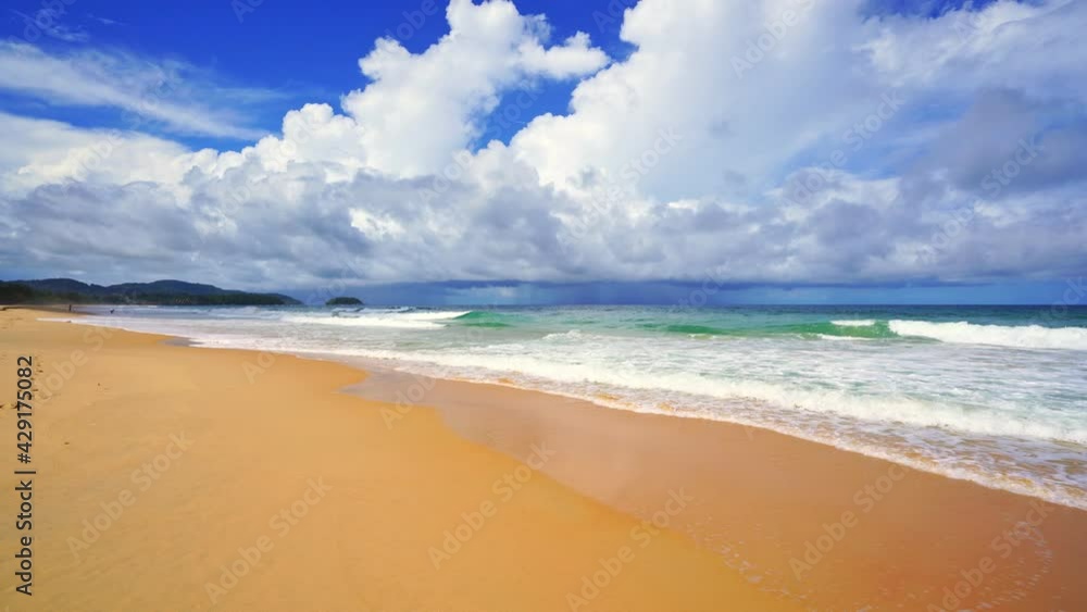 Summer sandy beach Amazing sea clear blue sky and white clouds Wave crashing on sandy shore empty beach at Phuket Thailand, Empty beach after covid-19 Concept Travel and season tour website background Summer sandy beach Amazing sea clear blue sky and white clouds Wave crashing on sandy shore empty beach at Phuket Thailand, Empty beach after covid-19 Concept Travel and season tour website background