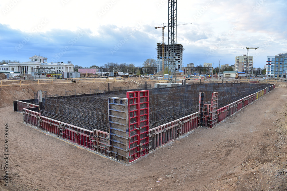 Сonstruction site with foundation pit for monolithic reinforced