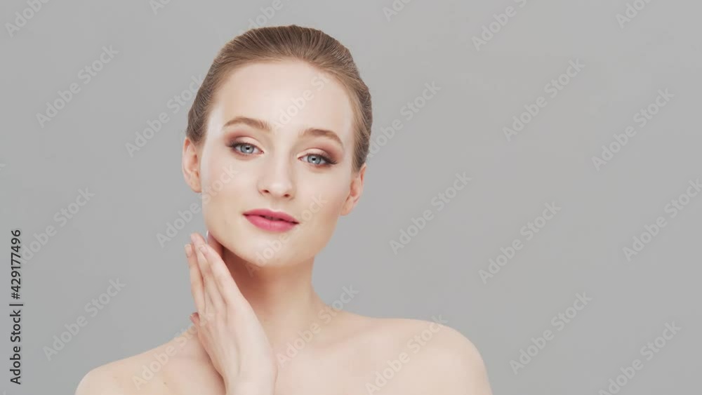 Studio portrait of young, beautiful and natural woman. Face lifting, cosmetics and make-up concept. Studio portrait of young, beautiful and natural woman. Face lifting, cosmetics and make-up concept.