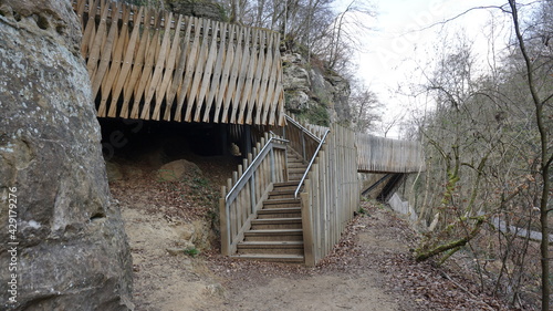 a wooden bridge on the trail to the Schiessent  mpel in the Mullerthal  in Luxembourg  April