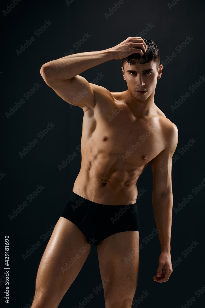 handsome man in dark panties muscled studio model handsome man in dark panties muscled studio model