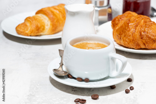 breakfast with espresso and croissants