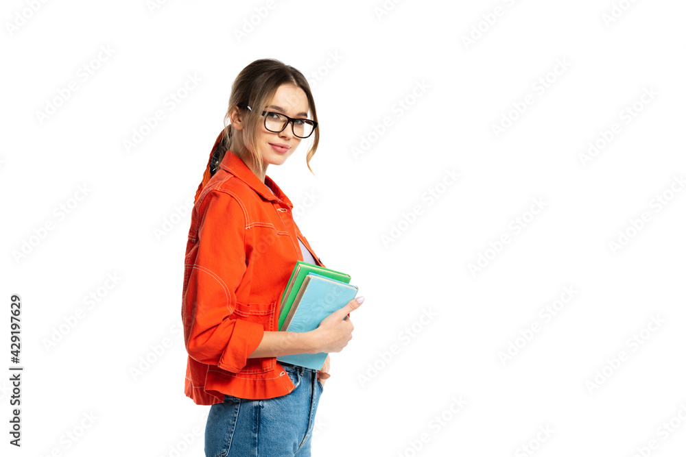 young student in glasses holding books isolated on white young student in glasses holding books isolated on white