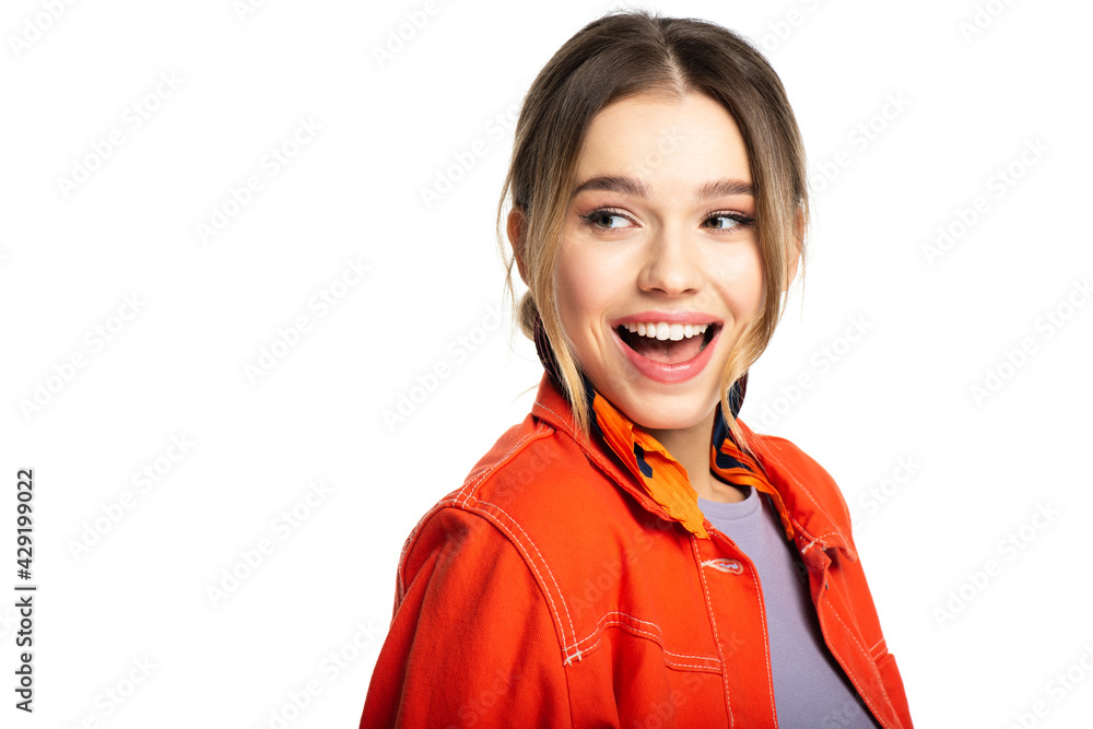 amazed young woman in orange shirt isolated on white amazed young woman in orange shirt isolated on white