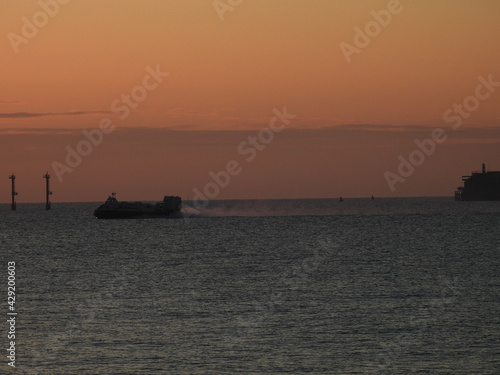 fishing boat at sunset © Mark C