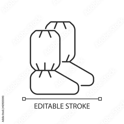 Medical boot covers linear icon. Protective wear from dangerous contamination. Disposable PPE. Thin line customizable illustration. Contour symbol. Vector isolated outline drawing. Editable stroke