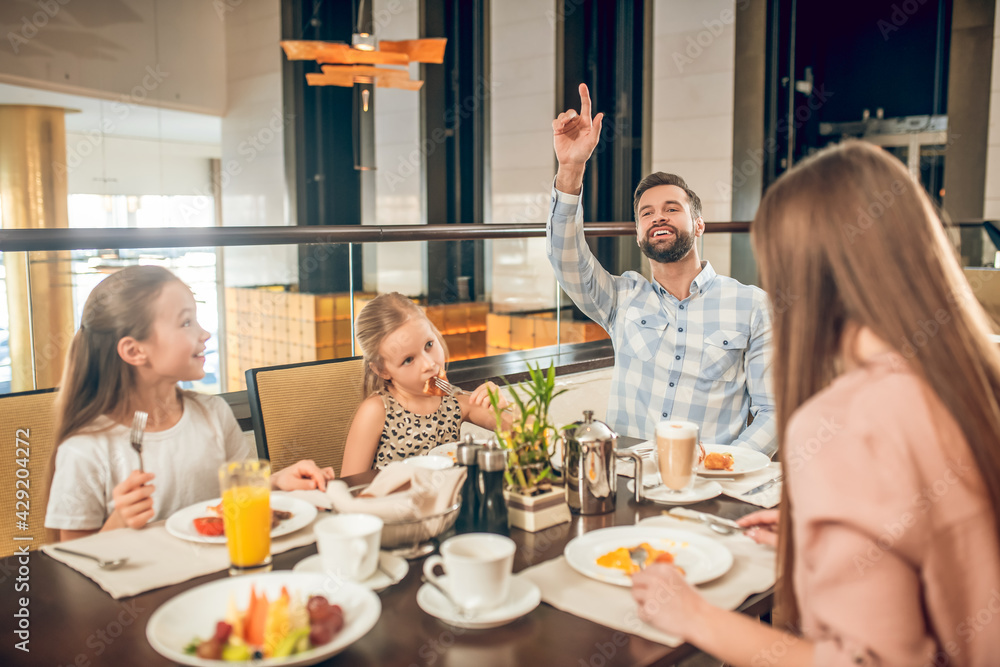 Cute family spending time together at breakfast Cute family spending time together at breakfast