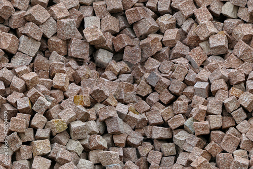 a pile of granite and porphyry paving stones, pattern photo