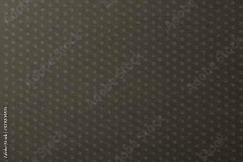 水玉模様のある茶色い紙の背景テクスチャー
