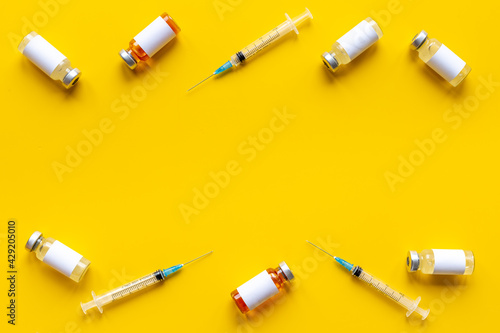 Medical vials with vaccine. Top view, copy space