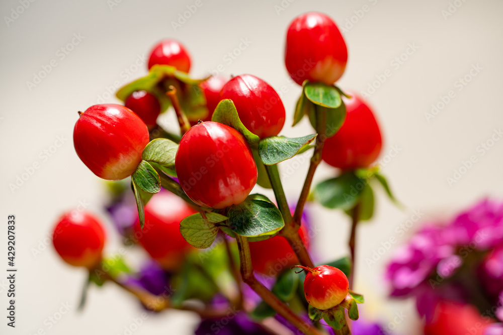 Fake berries flower arrangement macro photo Fake berries flower arrangement macro photo