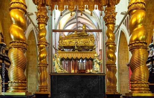 Gniezno Cathedral interior with symbolic sarcophagus and coffin of St. Adalbert, Sw. Wojciech, martyr in old town Lech Hill historic city center in Gniezno, Poland