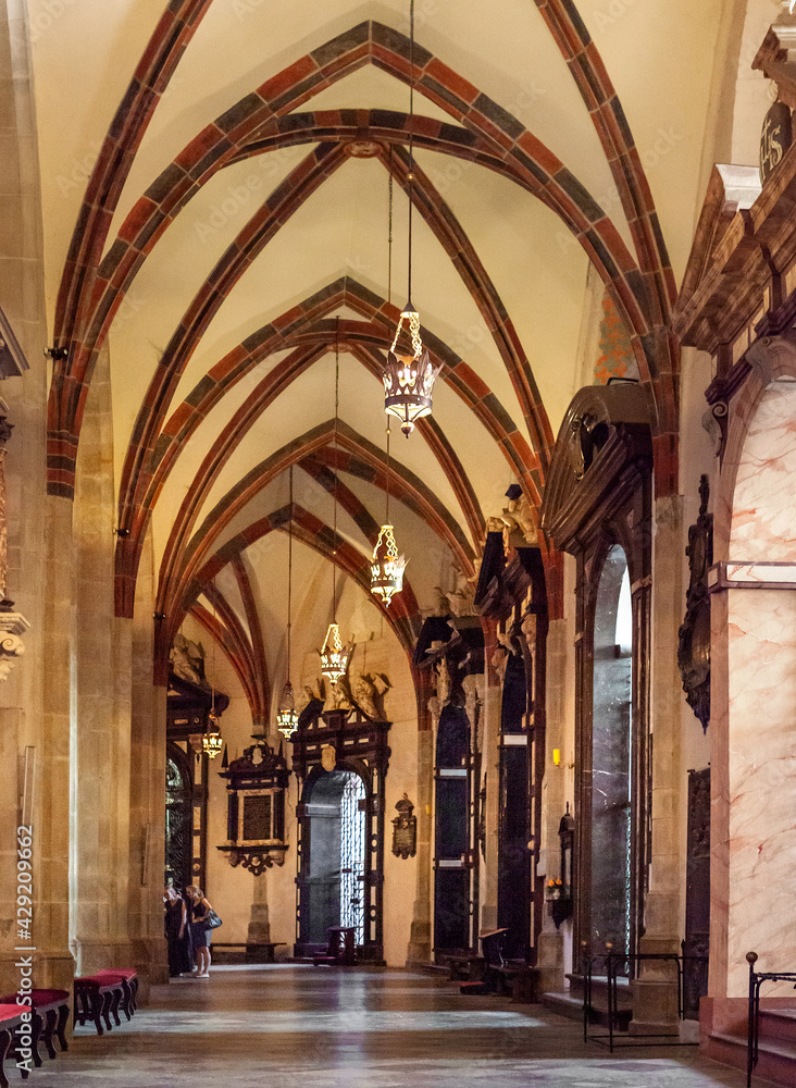 Gothic aisle of Gniezno Cathedral with symbolic sarcophagus and coffin of St. Adalbert, Sw. Wojciech, martyr in old town Lech Hill historic city center of Gniezno, Poland