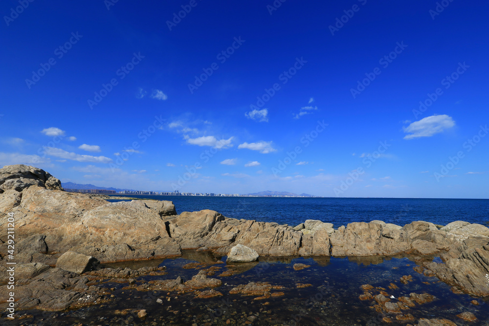 Seaside view with blue sky background