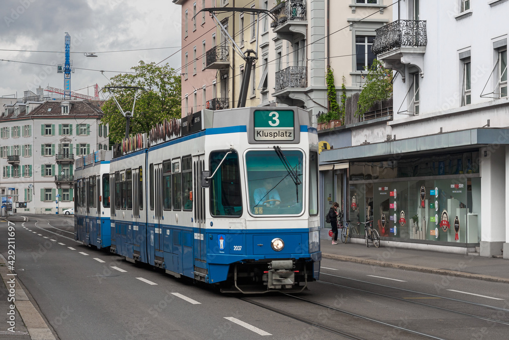 Switzerland, Zurich - November, 2020 - Typical blue tram on the streets of Zurich