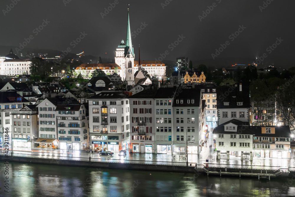 Night view of the river Limmat and houses in Zurich