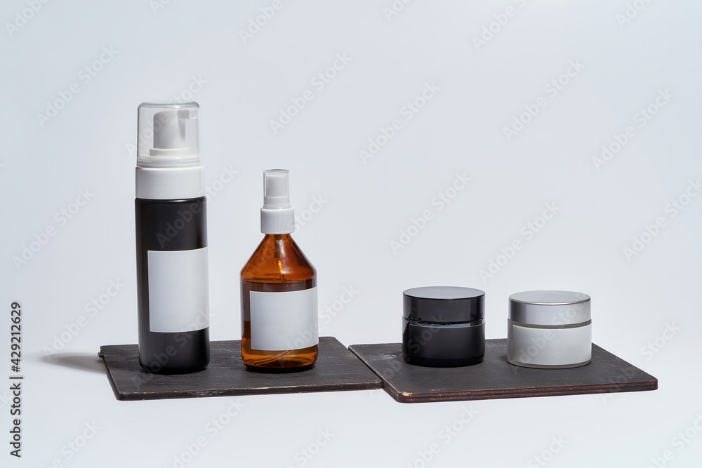 Set of cosmetological bottles with empty labels Set of cosmetological bottles with empty labels