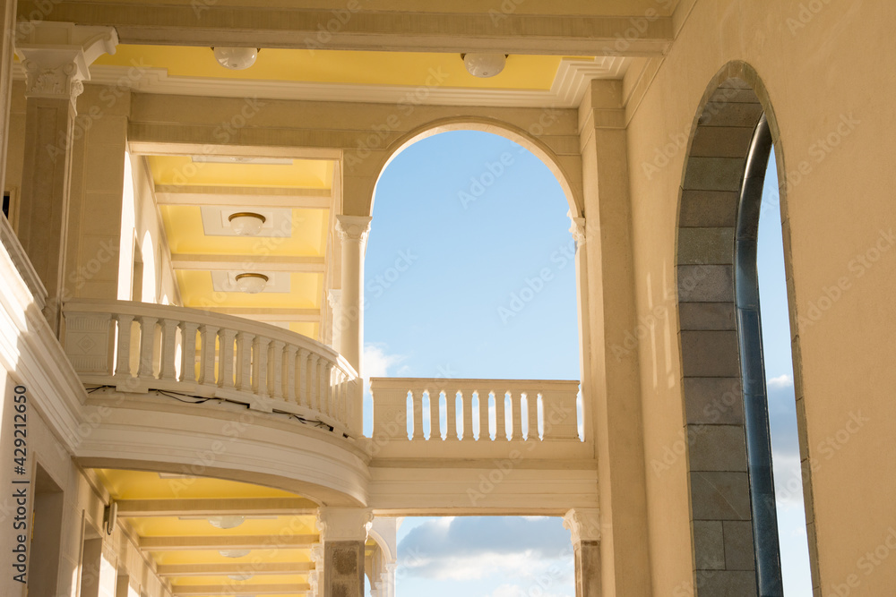 Fototapeta premium Semicircular window balcony frames of the palace. Interior