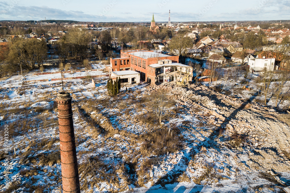 Aerial view of abandoned Kuldiga town match factory and wood processing company Vulkans demolish, Latvia.