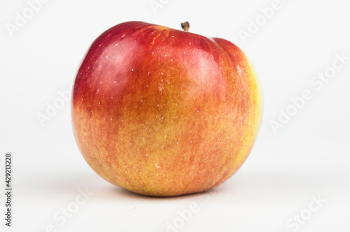 red apple with white background.