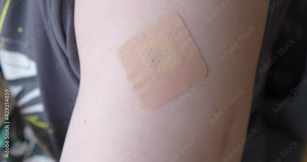 Using ice cube to cool off sore arm after Covid19 vaccination