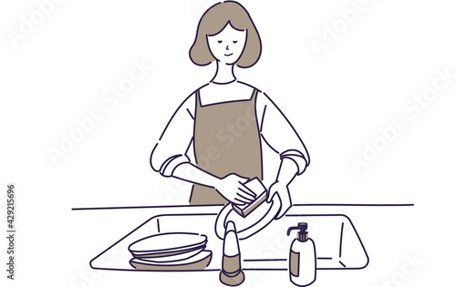 皿洗いをする女性