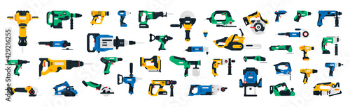 Large collection of construction power tools. Impact wrench, screwdriver, plane, chainsaw, jigsaw, cordless grinder, glue gun, riveter, dryer, jackhammer, rotary hammer drill cordless recip nailer