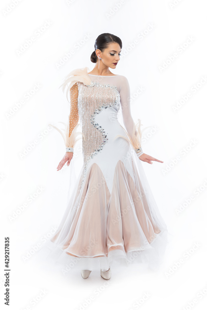 Beautiful young woman in an amazing white Latino dress. Beautiful young woman in an amazing white Latino dress.