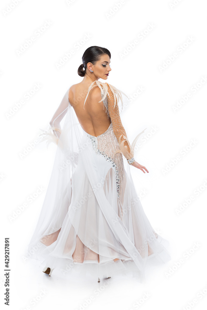 Beautiful young woman in an amazing white Latino dress. Beautiful young woman in an amazing white Latino dress.