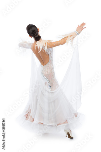 Beautiful young woman in an amazing white Latino dress.