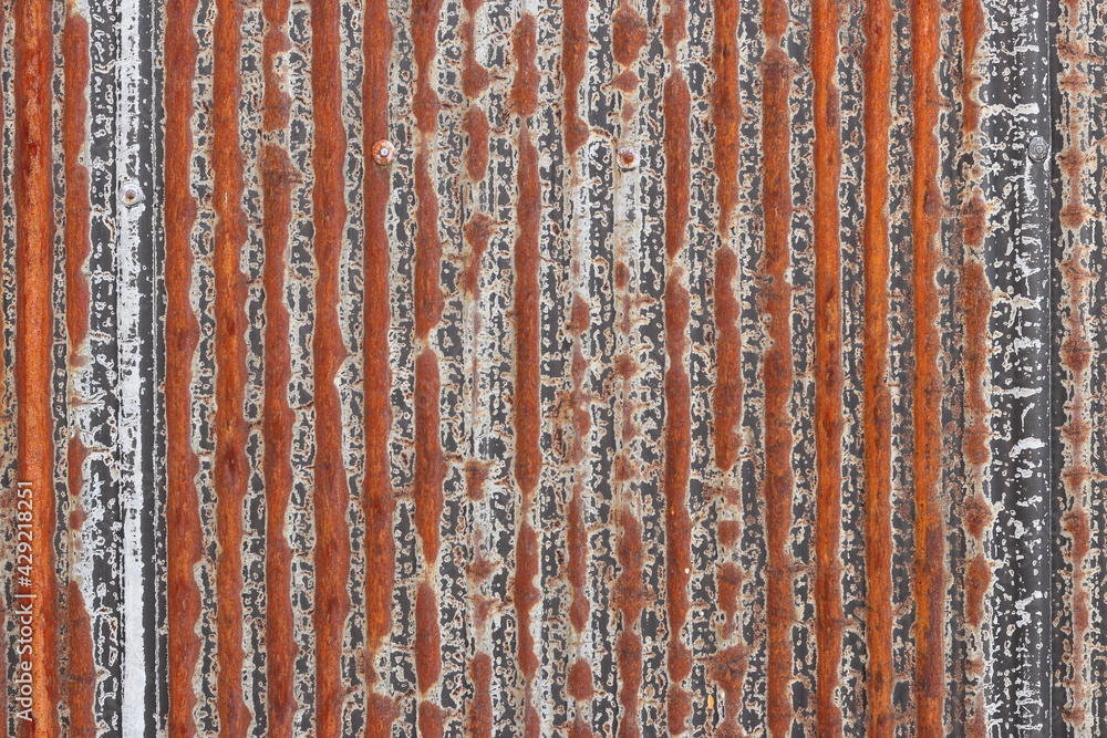 錆びたトタンの壁