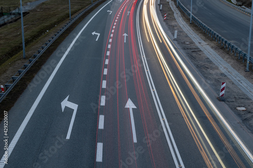 lights of moving cars at night. long exposure