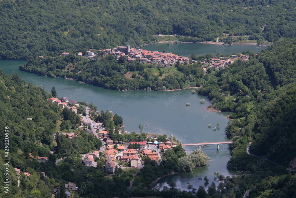 Tuscany lake of Vagli  in Garfagnana with the village of Vagli di Sotto.