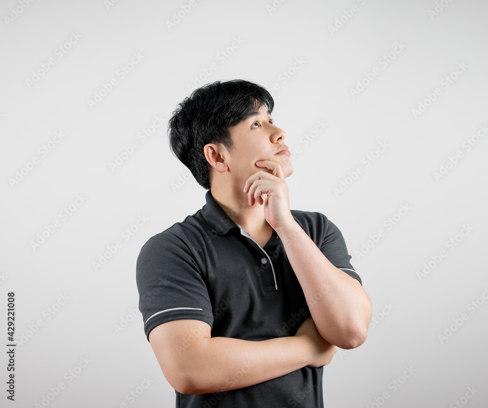 Portrait of man office worker standing and thinking about decision, dreaming of success, pondering new startup. isolated white background. 
Asian handsome man.