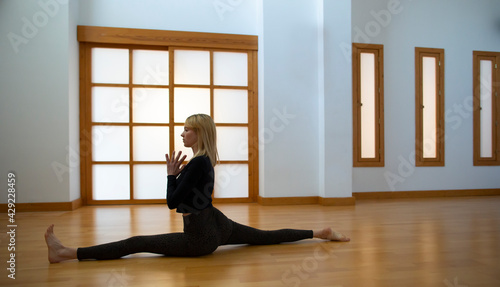 Young woman practicing yoga in a Japanese style room Free Download Young woman practicing yoga in a Japanese style room - GFXLoad