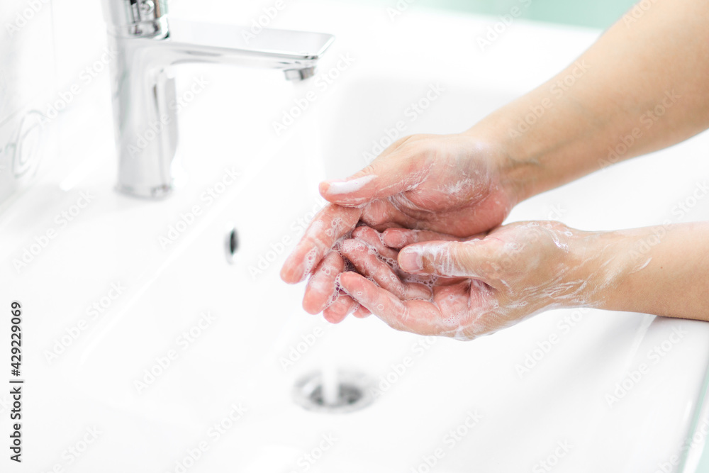 thorough hand washing with soap and water to prevent coronavirus - Image thorough hand washing with soap and water to prevent coronavirus - Image