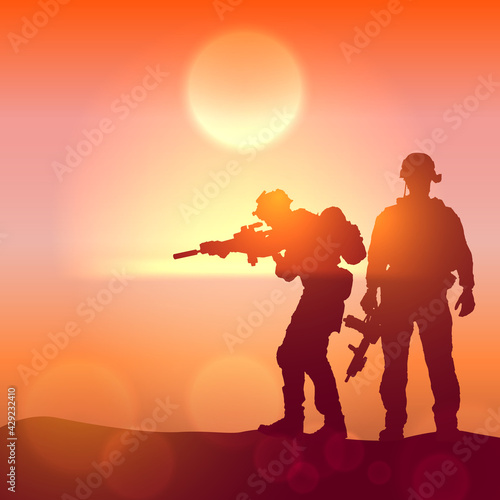 Silhouette of a soldiers against the sunrise. Concept - protection, patriotism, honor.
