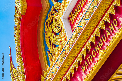 Colorful Wat Don Mueang Phra Arramluang buddhist temple Bangkok Thailand. photo