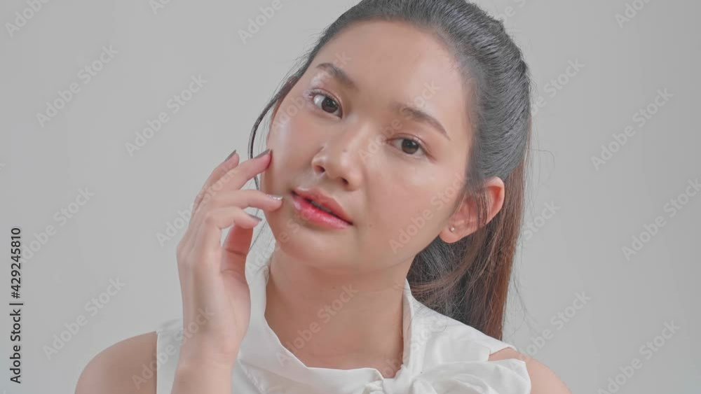 Beautiful Woman Cares For The Skin Face Posing At Studio
Beautiful Woman Cares For The Skin Face Posing At Studio