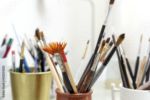 Artist's brushes in a Jar