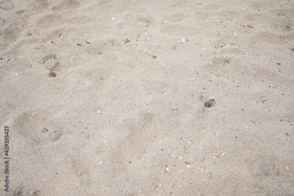 the sand beach is slightly reddish white the sand beach is slightly reddish white